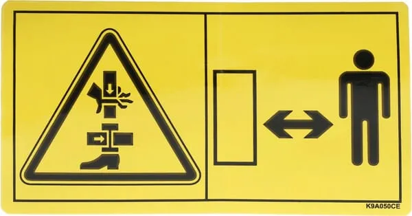 Štítek Nebezpečí přiskřípnutí pohybujícími se díly